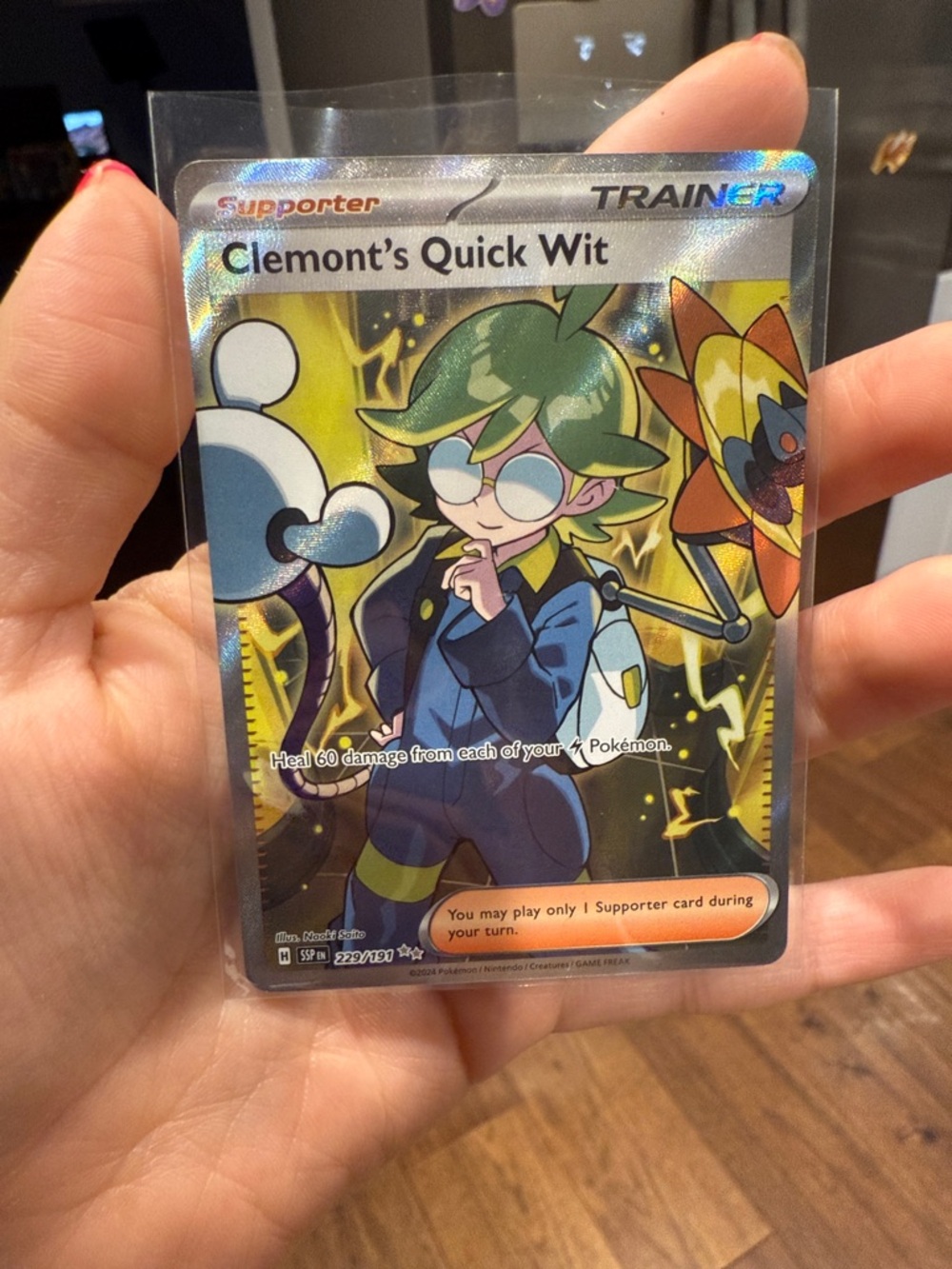 Clemonts Quick Wit Card IR 229/191 Surging Sparks